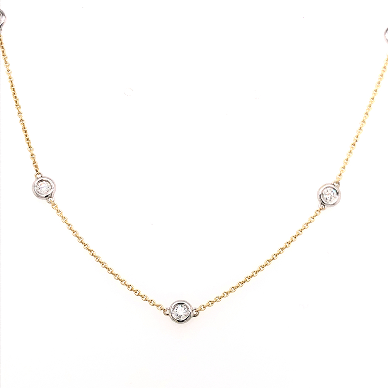 Lady s Yellow 14 Karat Diamonds by the yard Necklace Length 19" With 5=0.30ctw Round Brilliant G SI Diamonds set in white gold.
