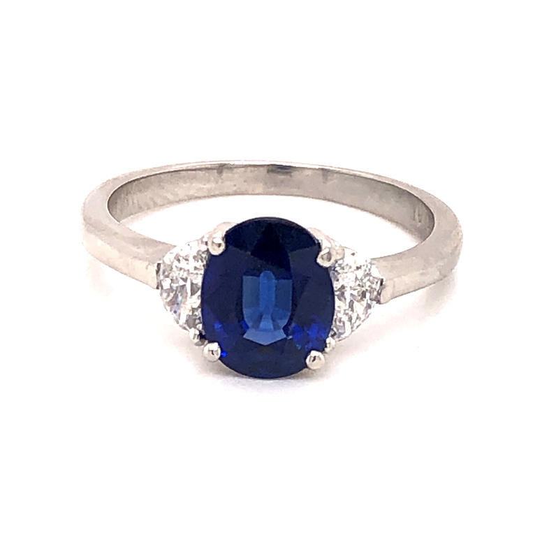 Lady s Platinum sapphire and diamond ring with 2.39 carat oval sapphire and two half moon shaped diamonds 0.49 carat total weight G color  VS in clarity.