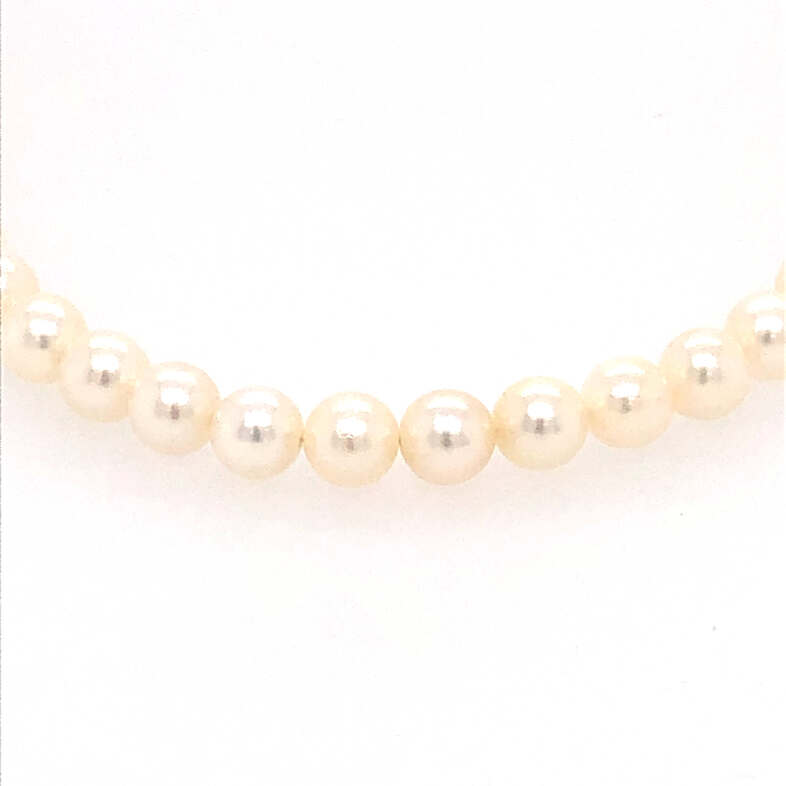 Lady s White 14 Karat 14" Strand With 76 5 MM cultured pearls.