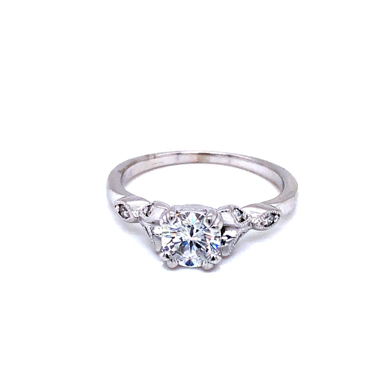 Lady s White 14 Karat Engagement Ring With One 0.70Ct Round Brilliant G I1 Diamond And 6=0.10Tw Round Brilliant G VS Diamonds