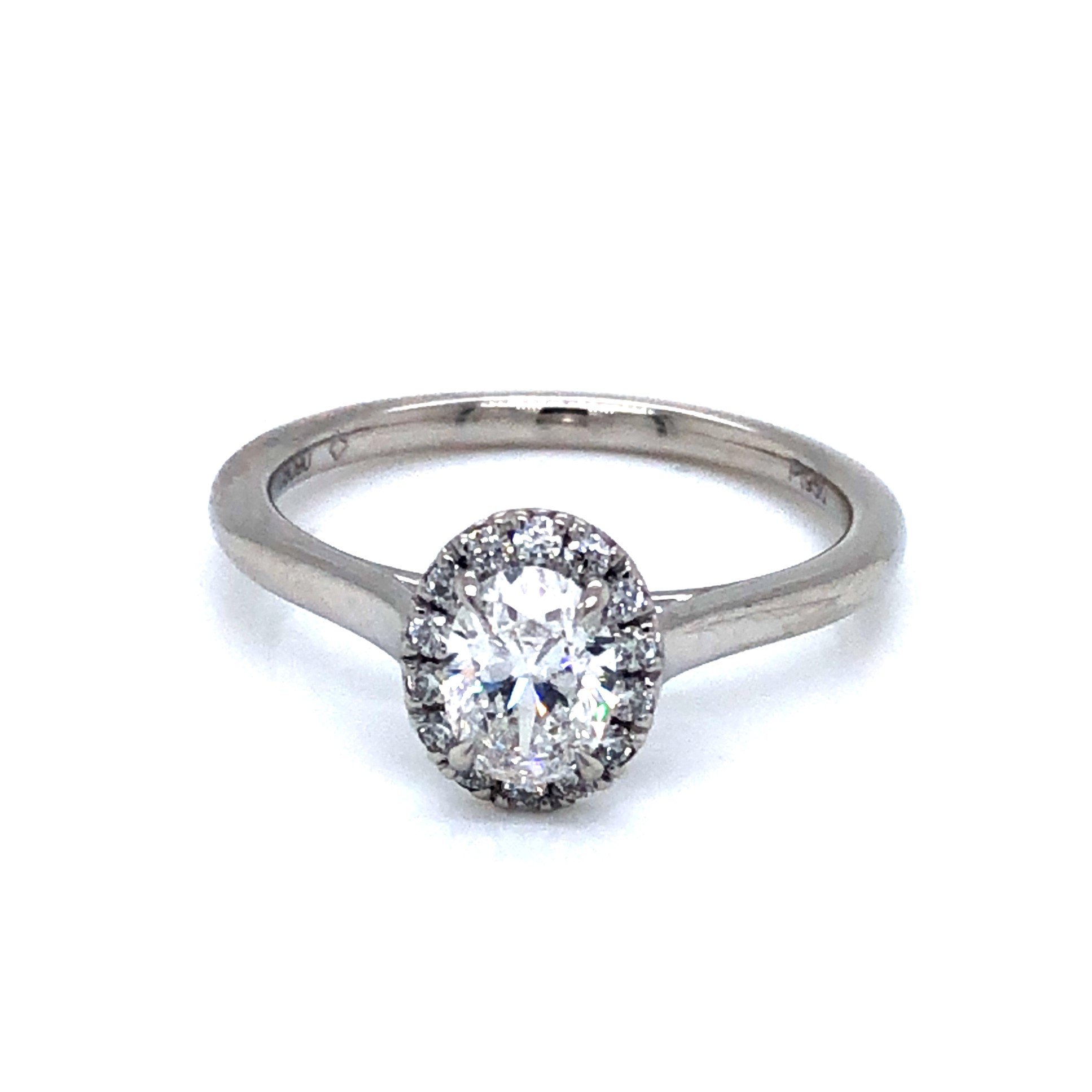 Ladies Platinum Engagement Ring With One 0.52Ct Oval F SI2 ForeverMark Diamond And 14=0.15Tw Round Brilliant G VS Diamonds
