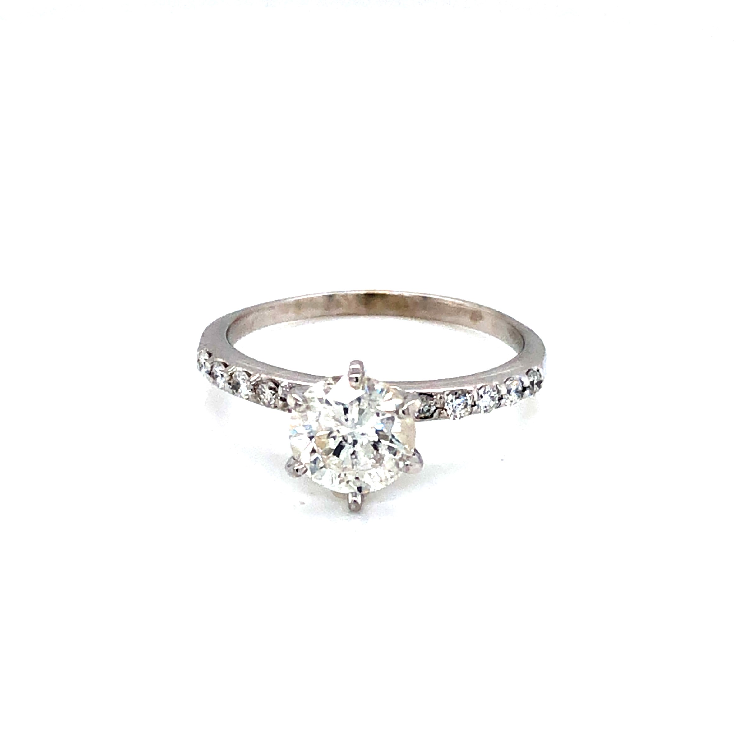Lady s White 14 Karat Engagement Ring With One 1.01Ct Round Brilliant H I2 Diamond And 10=0.15Tw Round Brilliant G SI Diamonds