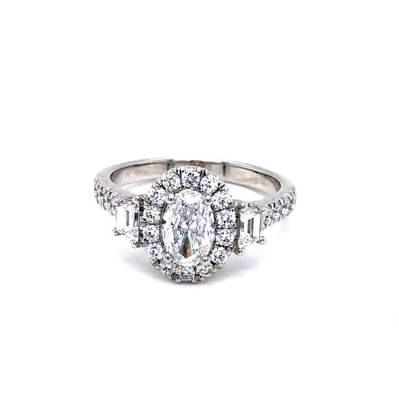 Ladies 14 karat white gold Diamond Engagement ring with center 0.70 carat  I color  VS1 clarity Oval Diamond and 0.84 carat total weight  G color  VS clarity accent Diamonds