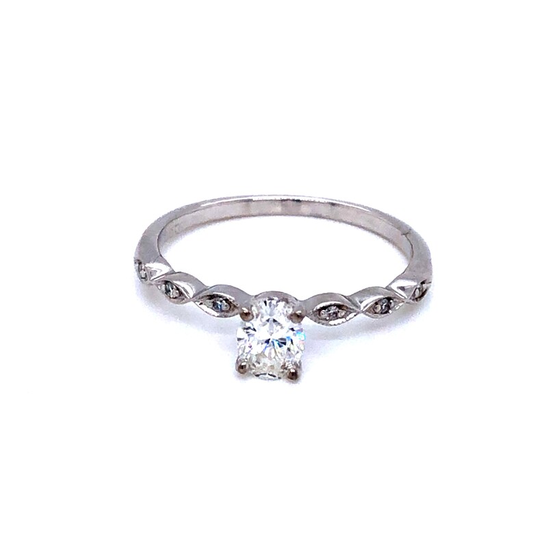 Lady s Ring With One 0.39CT Oval H VS2 Diamond And 6=.03 Round Brilliant G VS Diamonds