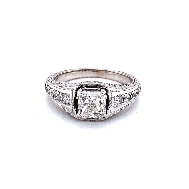 Ladies White 14 Karat Ring With One 1.01CT Radiant H I1 Diamond And 8=0.30TW Round Brilliant G VS Diamonds