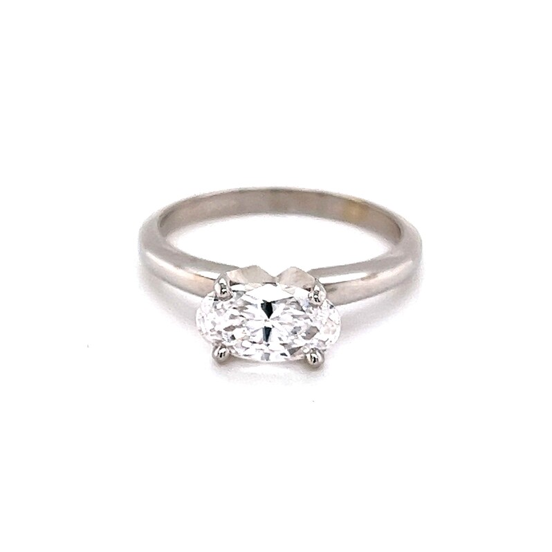 Ladies White 14 Karat Ring With One 1.03Ct Oval F SI1 Diamond Set Across the Finger.