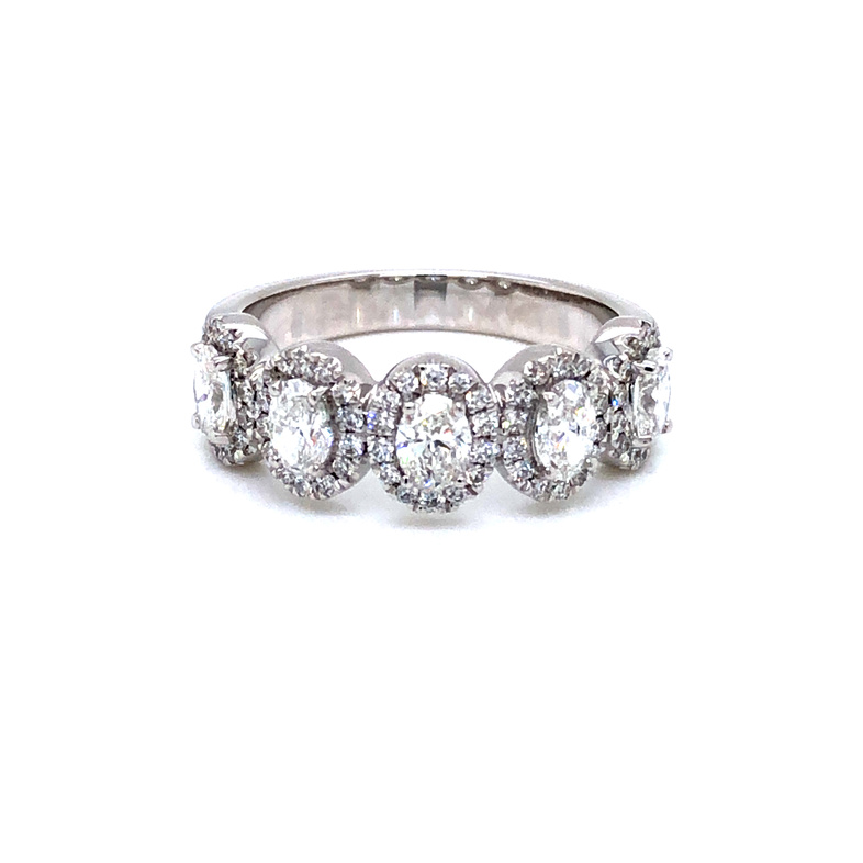 14 karat white gold Diamond band with Oval Diamonds in halos  1.32 carat total weight  G color  VS clarity