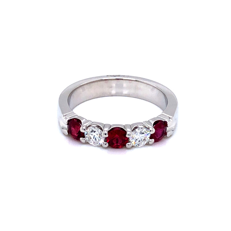 14 karat white gold Diamond and Ruby band  0.35 carat total weight  G color  VS clarity Diamonds and 0.65 carat fine quality Rubies