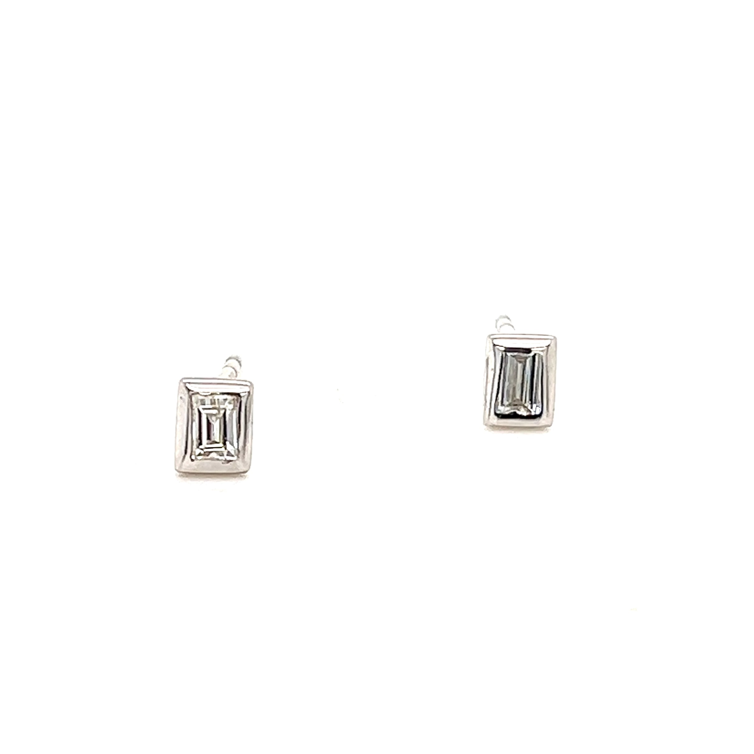 White 14 Karat Baguette Stud Earrings With 2=0.20Tw Baguette Diamonds
