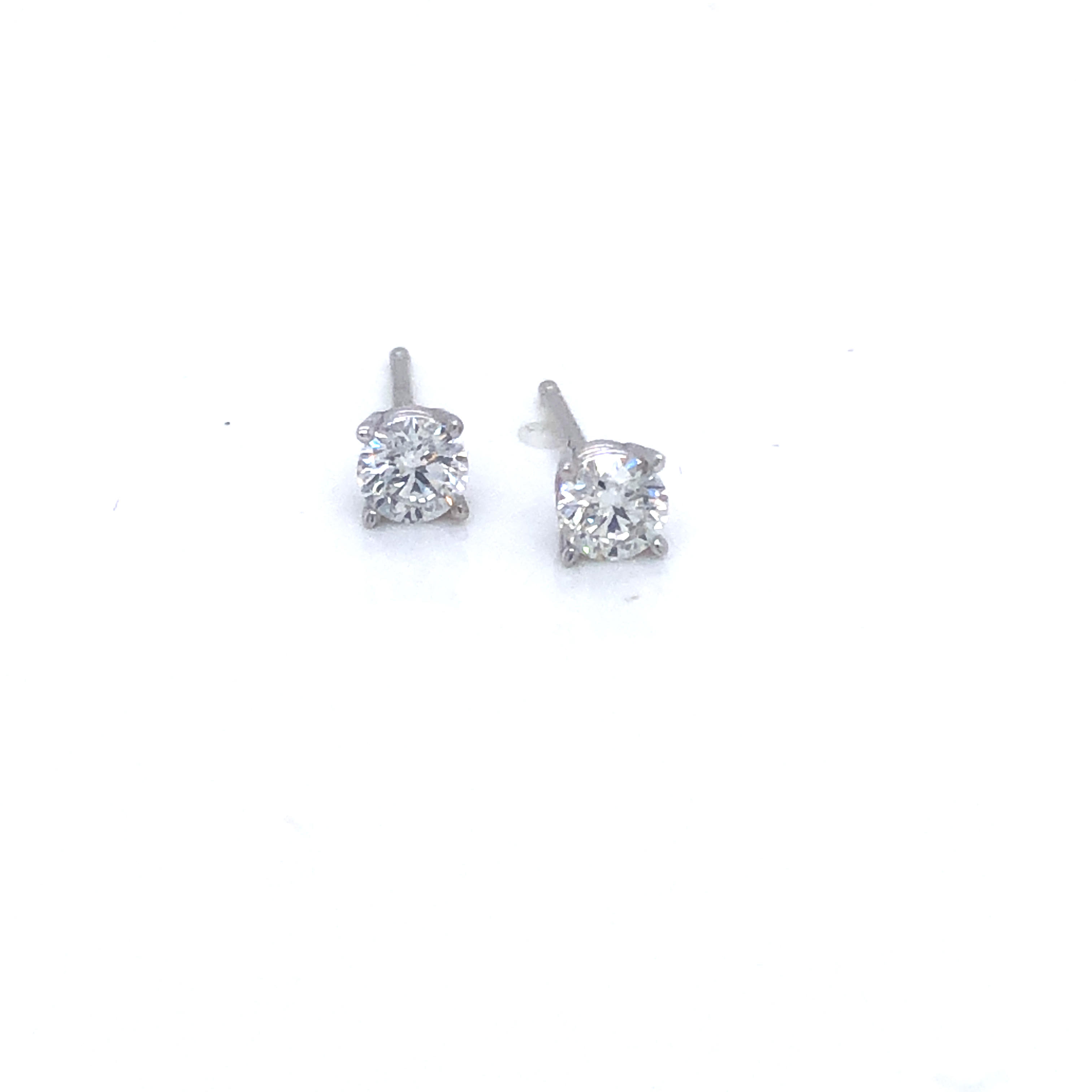 Lady s White 14 Karat Earrings With 2=0.40TW Round Brilliant G SI1  Diamonds