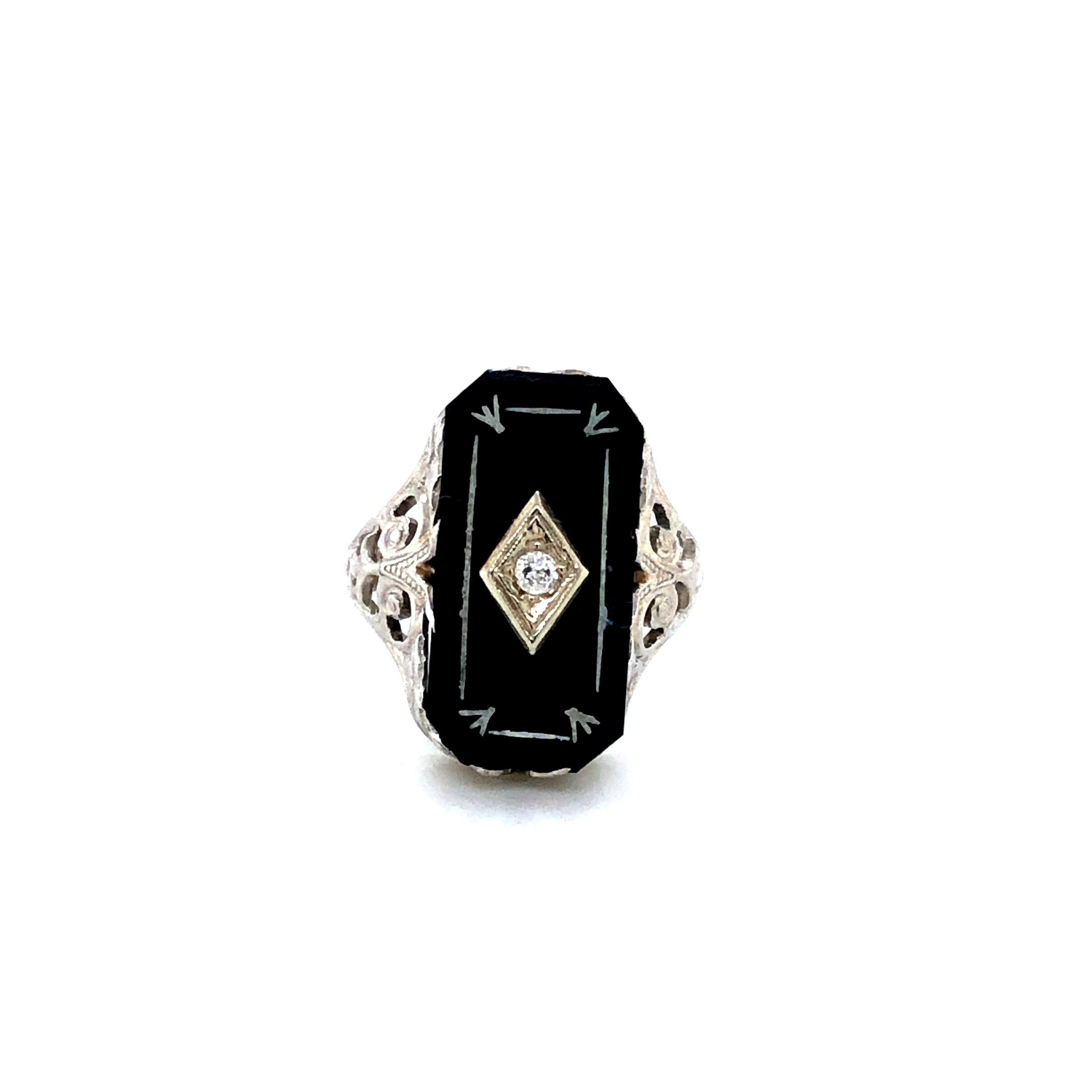 Lady s White 14 Karat Estate Ring With One 0.04CT Old European Cut Diamond set on a Black Onyx Plate.