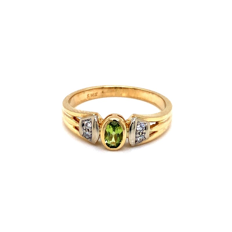 Lady s Yellow 14 Karat Ring With One 5.00X3.50MM Oval Peridot And 4=0.10TW Round Brilliant G VS Diamonds