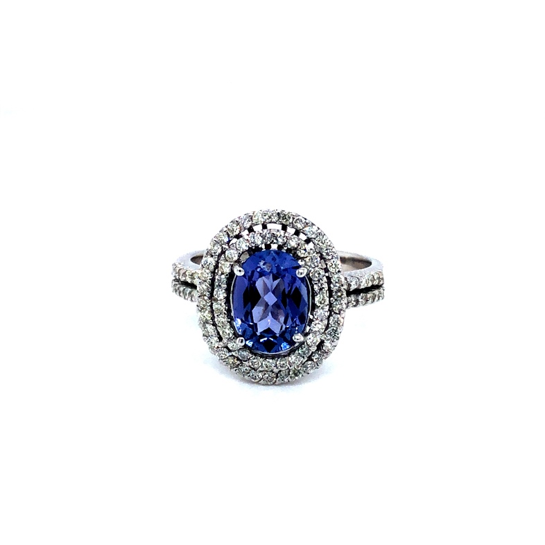 Lady s White 14 Karat Ring With One 1.70Ct Oval Tanzanite And 85=0.59Tw Round Brilliant G SI Diamonds