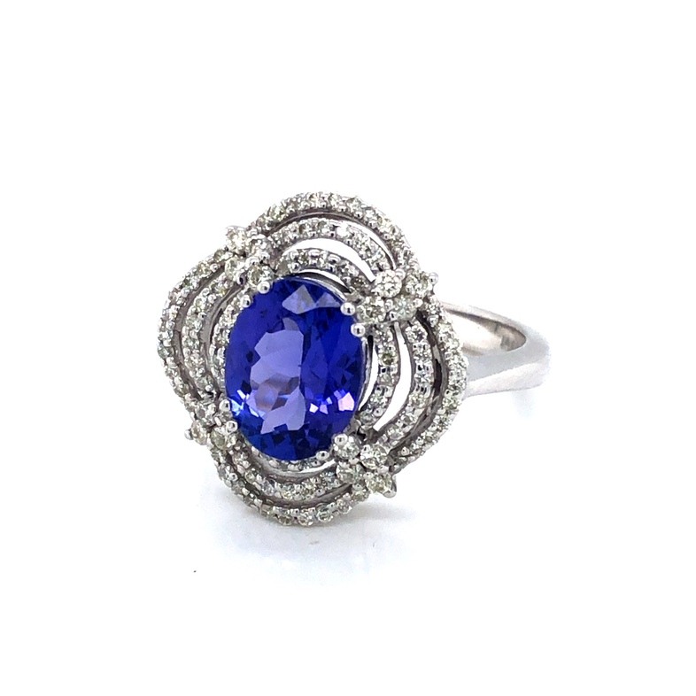 Lady s White 14 Karat Ring With One 1.70Ct Oval Tanzanite And 100=0.47Tw Round Brilliant G SI Diamonds