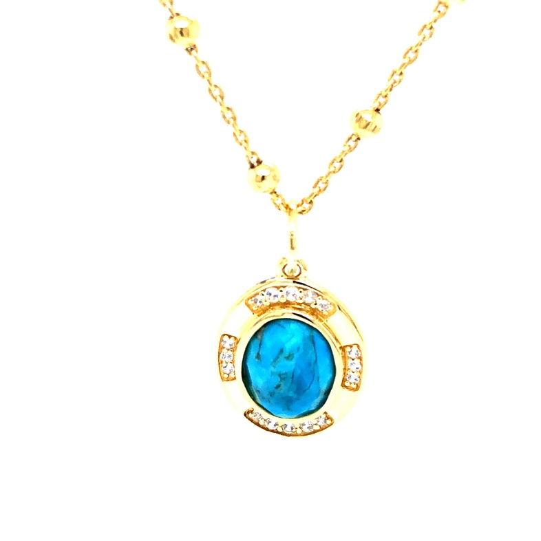 Sterling silver plated 14 karat gold turquoise pendant on a satelitte ball chain.