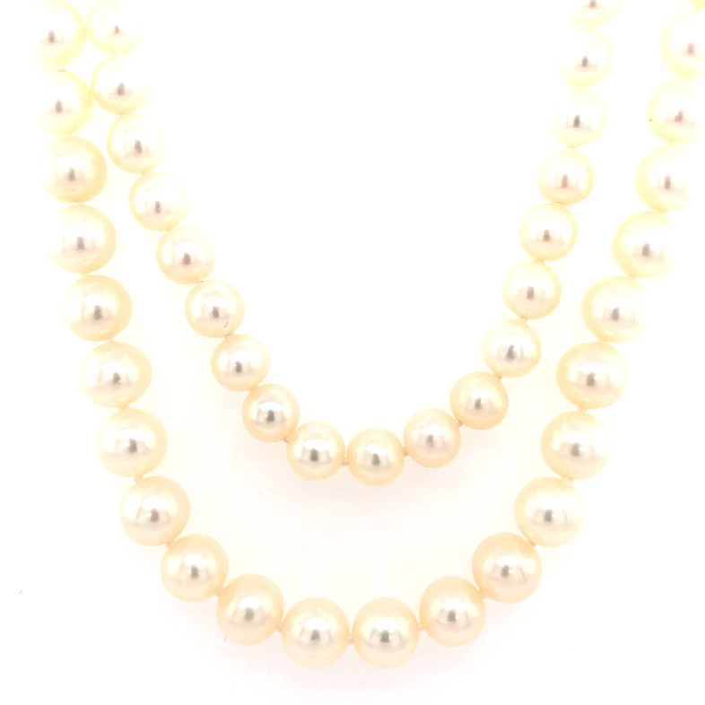 Lady s 18" Strand With 59=8.00Mm Cultured Pearls And 64=5.00Mm Cultured Pearls with 14 Karat Yellow Gold Clasp.