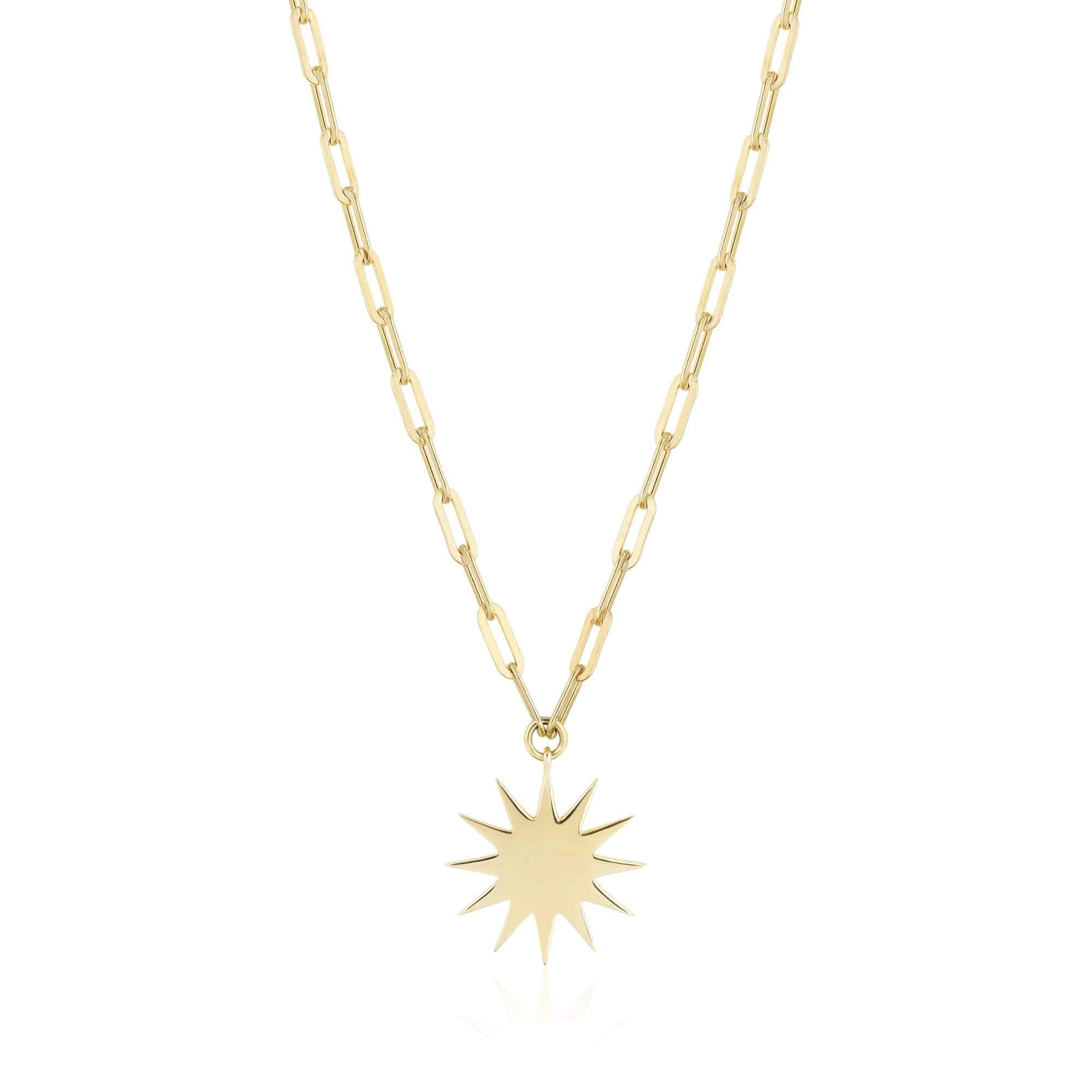 Sterling silver plated in 14 karat yellow gold starburst charm on 16" chain.