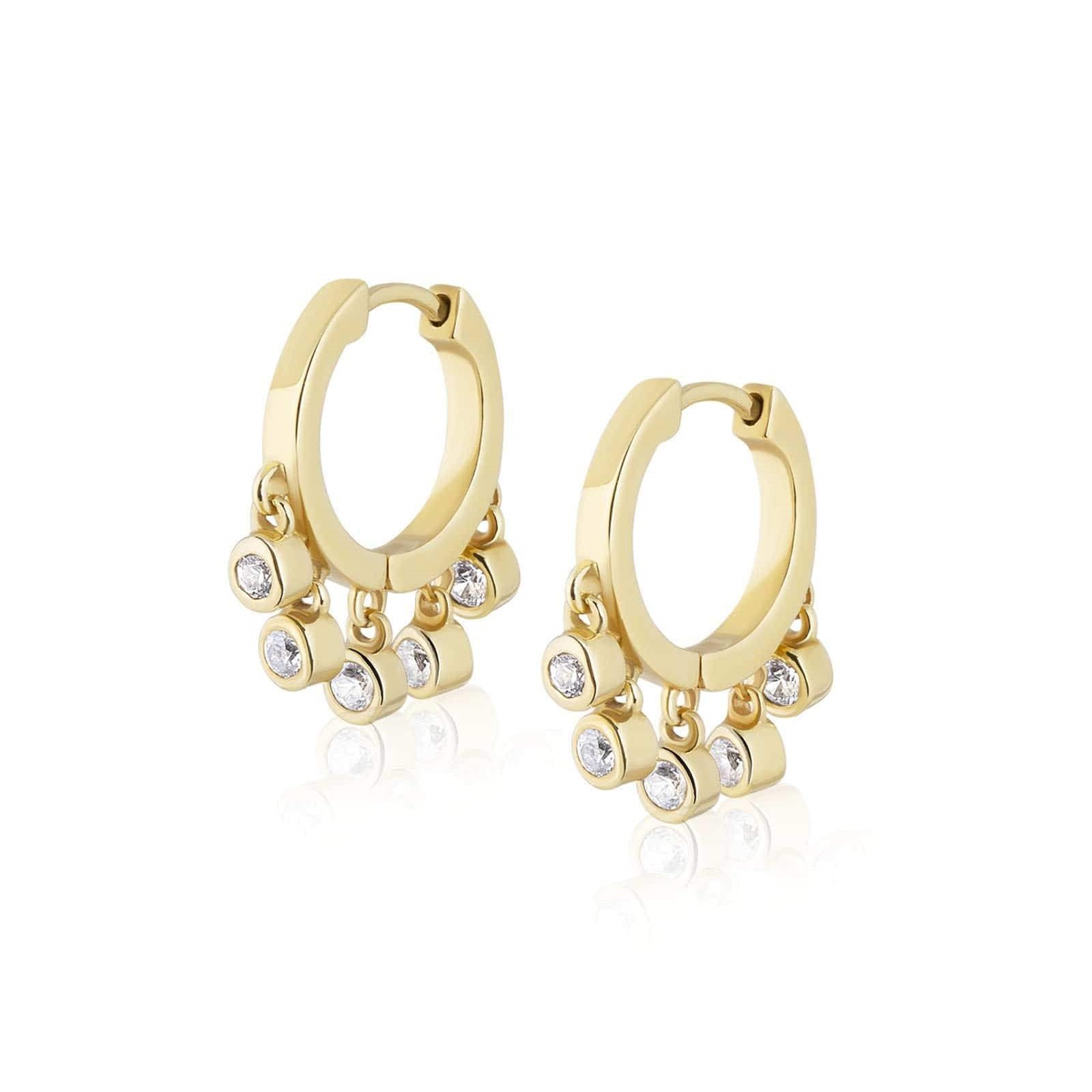 Sterling silver plated in 14 karat yellow gold huggies with white zircon dangles.