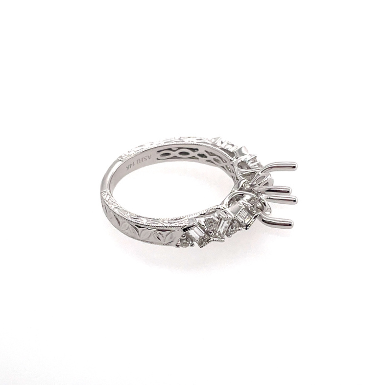 .55CTW DIAMOND CRISS-CROSS ROUND AND BAGUETTE SHANK ENGRAVED ENGAGEMENT RING SEMI MOUNTING CONTAINING: 6 BAGUETTE DIAMONDS + 8 ROUND DIAMONDS; 14KW