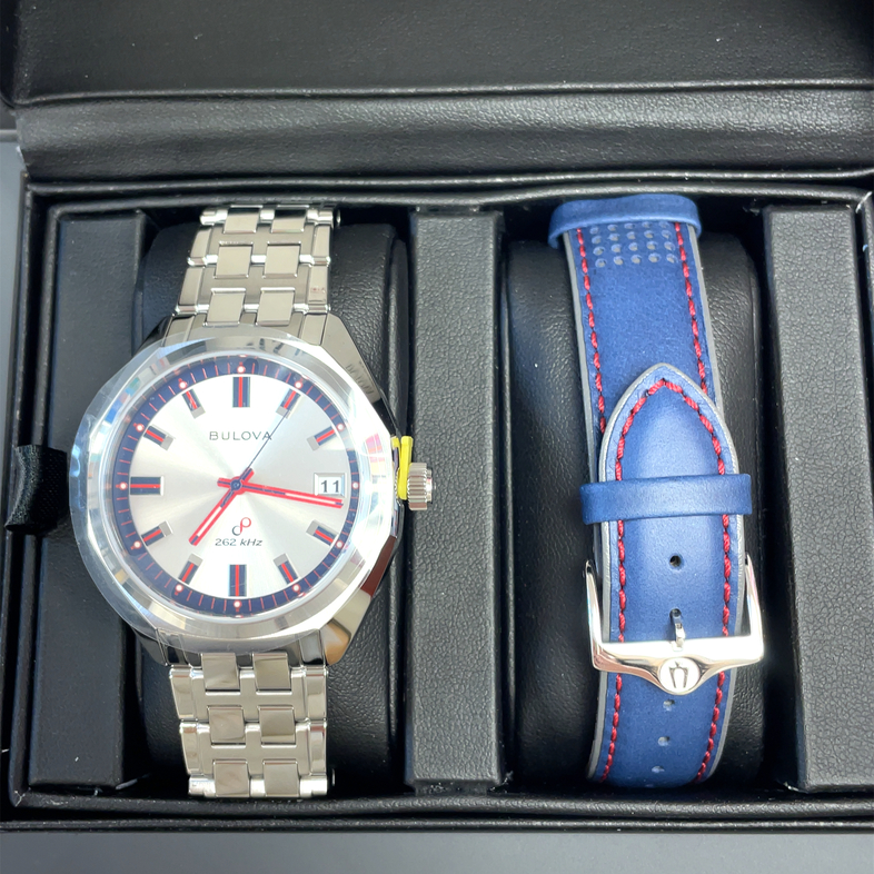 BULOVA JET STAR ROUND SILVER DIAL WITH RED/BLUE; LINK BRACELET; PLUS BLUE STRAP; STAINLESS