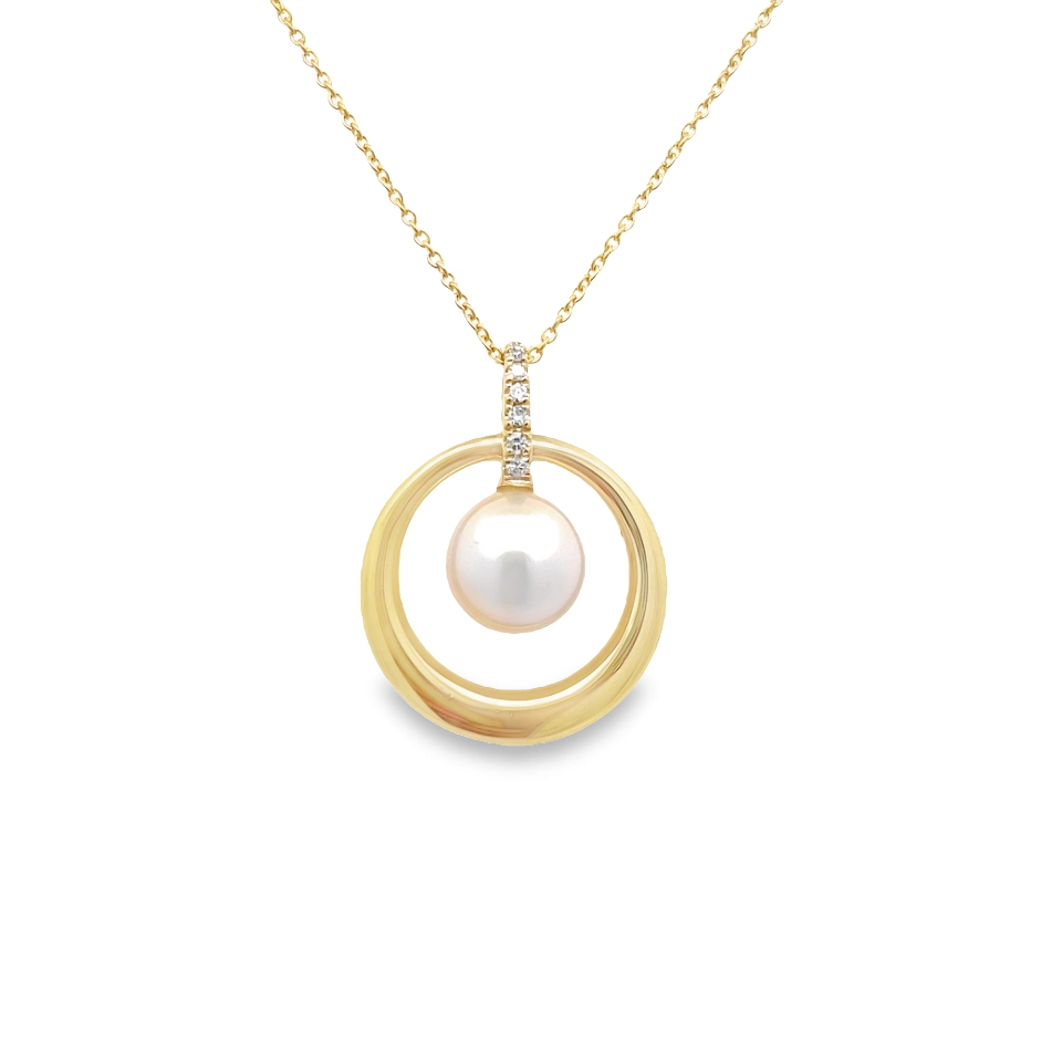 CULTURED PEARL AND DIAMOND CIRCLE PENDANT/CHAIN CONTAINING: 7 ROUND DIAMONDS; .03TDW; 14KY CHAIN INCLUDED